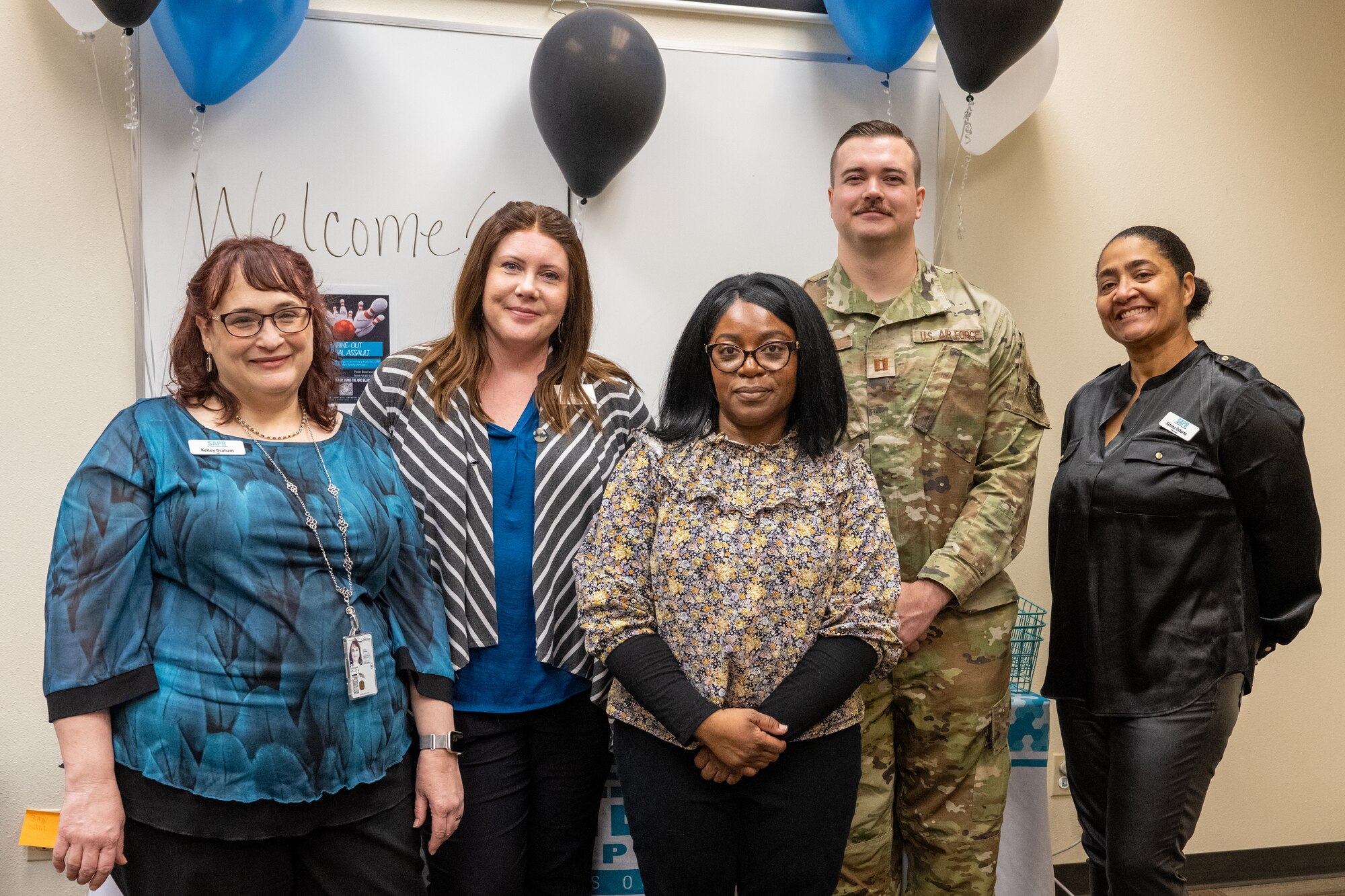 Members of the Sexual Assault Prevention and Response team host an open house for for Joint Base Elmendorf-Richardson personnel during Sexual Assualt Awareness and Prevention Month at JBER, Alaska, April 3.