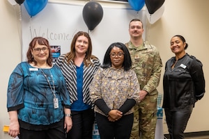 Members of the Sexual Assault Prevention and Response team host an open house for for Joint Base Elmendorf-Richardson personnel during Sexual Assualt Awareness and Prevention Month at JBER, Alaska, April 3.