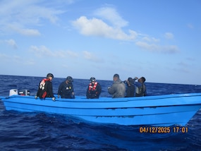 The crew members from Coast Guard Cutter Diligence interdict a suspected drug smuggling vessel offshore of Puerto Oviedo, Dominican Republic, April 12, 2025. USCGC Venturous’ (WMEC 625) crew offloaded more than 1,294 pounds of cocaine and 4,012 pounds of marijuana valued at approximately $14.1 million intercepted in the Caribbean Sea. (U.S. Coast Guard photo)
