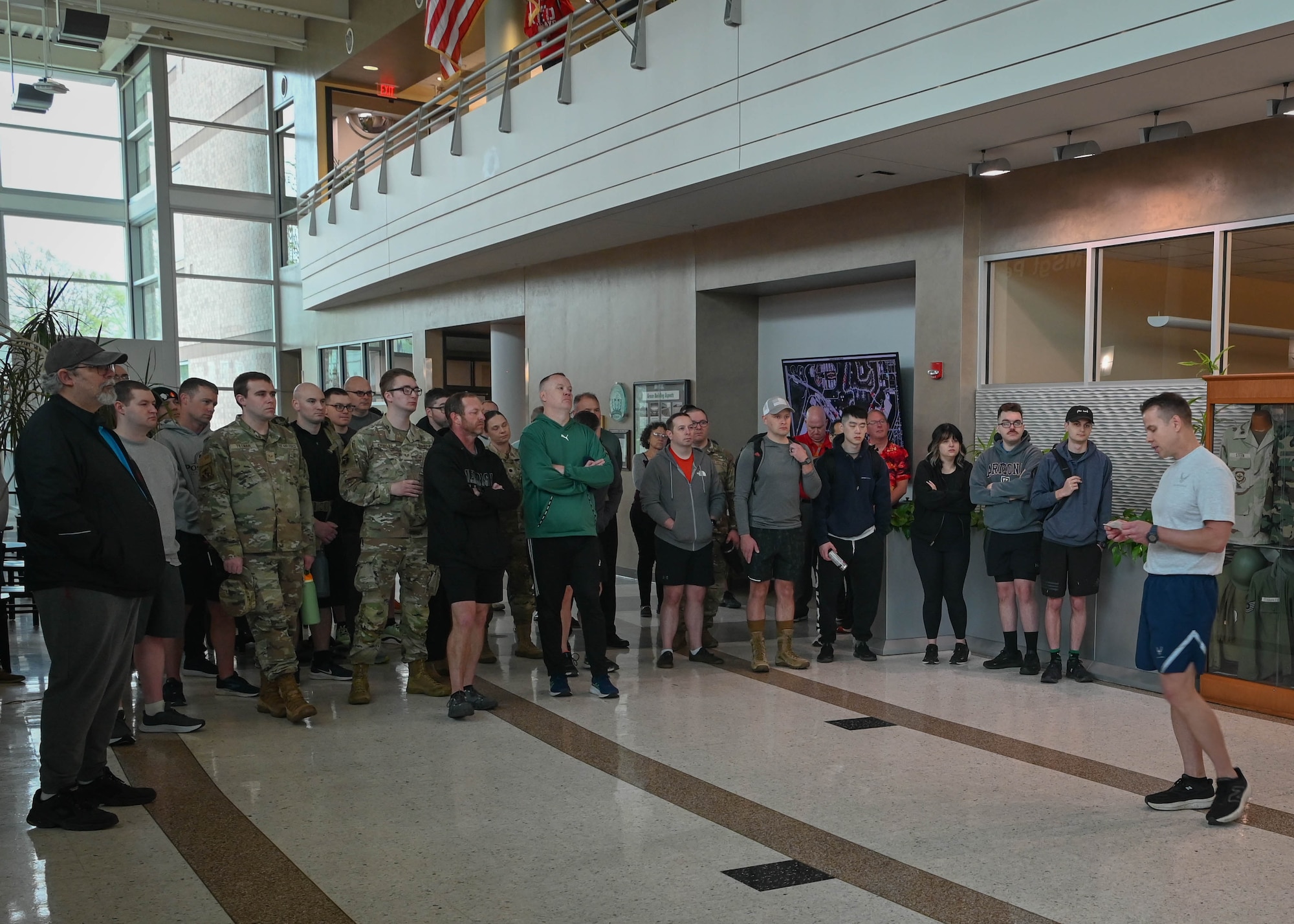 Col. Hank Chilcoat, 1st Weather Group commander, addresses participants of a ruck march memorializing Capt. Nathan Nylander, a 25th Operational Weather Squadron weather officer killed in Afghanistan in 2011, while at the 557th Weather Wing, April 25, 2025. More than 50 Airmen participated in the event. (U.S. Air Force photo by Daniel Martinez)