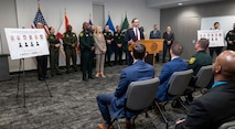 Press conference with local and federal law enforcement officials announcing that multiple people were arrested on federal charges in connection with murders in South Florida
