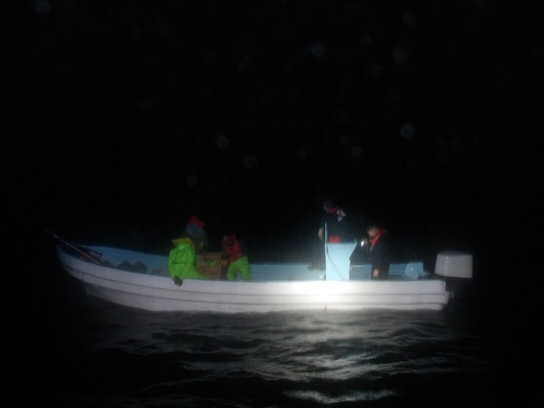 A Coast Guard law enforcement crew surveys a Mexican lancha offshore the southern Texas coast, April 21, 2025. Coast Guard Cutter Alert, Cutter Jacob Poroo, and Coast Guard Station South Padre Island interdicted a total of 12 Mexican fishermen engaged in illegal fishing north of the Maritime Boundary Line (MBL) in the Gulf of America. (U.S. Coast Guard courtesy photo)