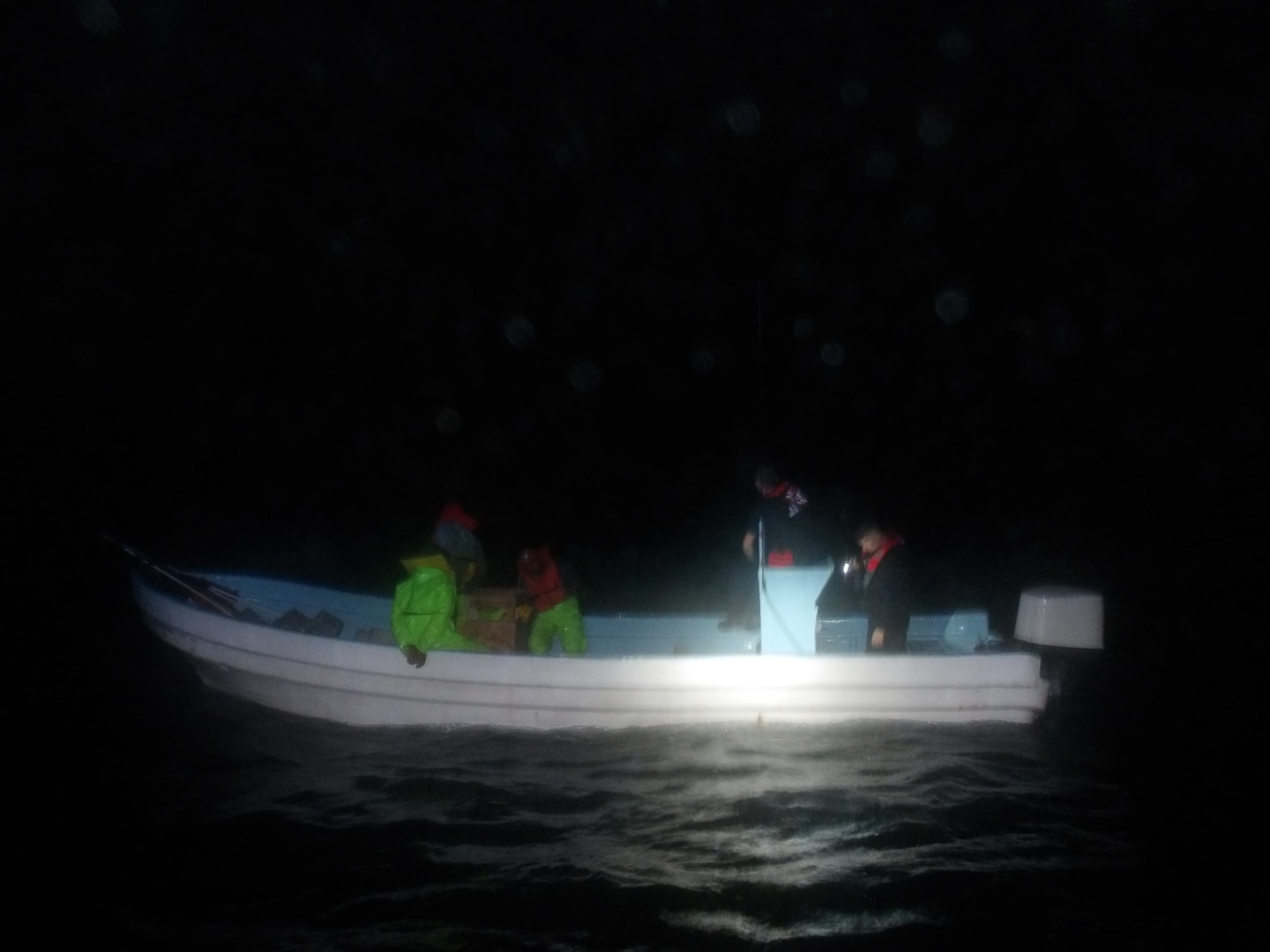 A Coast Guard law enforcement crew surveys a Mexican lancha offshore the southern Texas coast, April 21, 2025. Coast Guard Cutter Alert, Cutter Jacob Poroo, and Coast Guard Station South Padre Island interdicted a total of 12 Mexican fishermen engaged in illegal fishing north of the Maritime Boundary Line (MBL) in the Gulf of America. (U.S. Coast Guard courtesy photo)