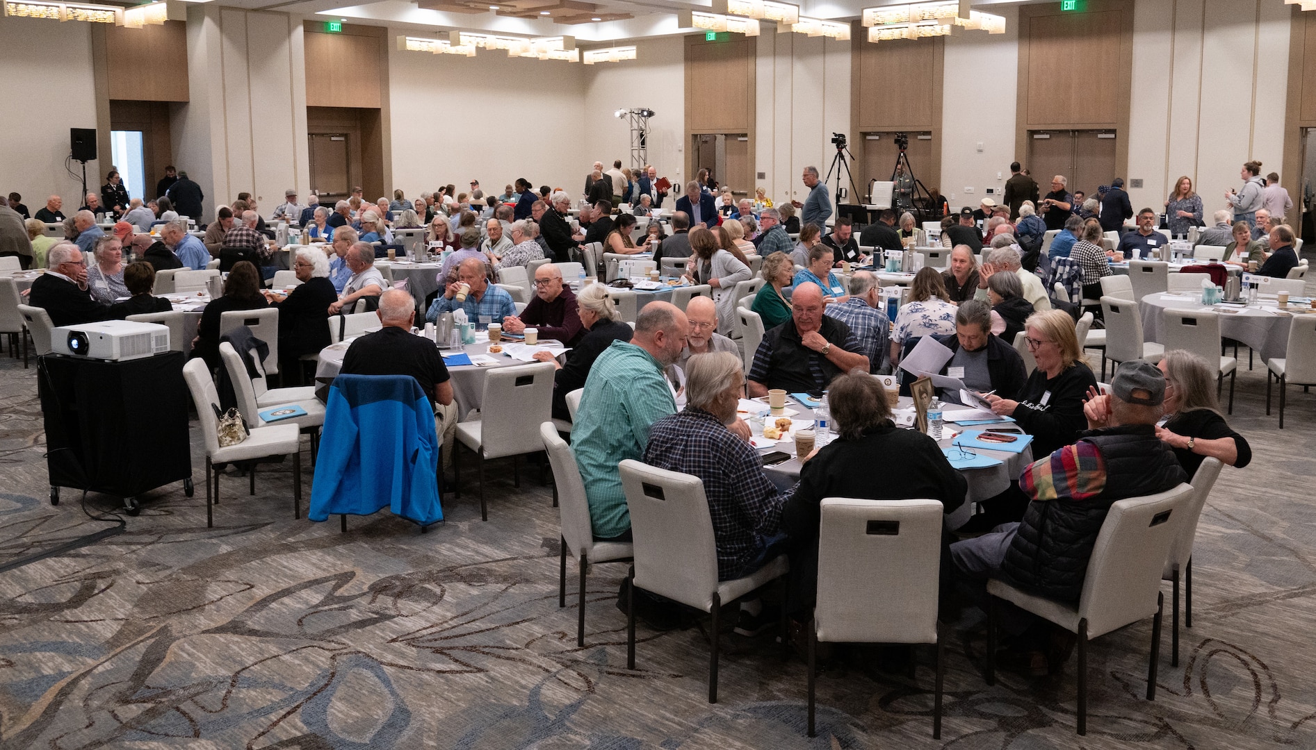 Families of missing service members gather for opening remarks at the Defense POW/MIA Accounting Agency Family Member Update, Bellevue, Washington, May 3, 2025.