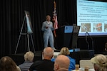Fern Sumpter Winbush, principal deputy director for the Defense POW/MIA Accounting Agency, gives an opening brief to families of missing service members at the DPAA Family Member Update, Bellevue, Washington, May 3, 2025.
