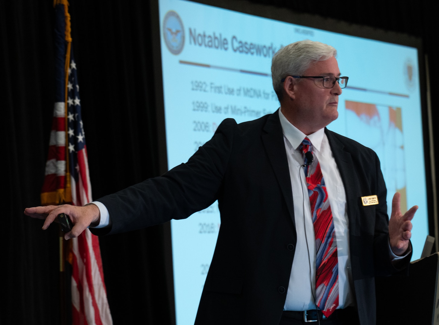 Dr. Tim McMahon, Department of Defense DNA Operations director, briefs family members of missing service members at the Defense POW/MIA Family Member Update, Bellevue, Washington, May 3, 2025.