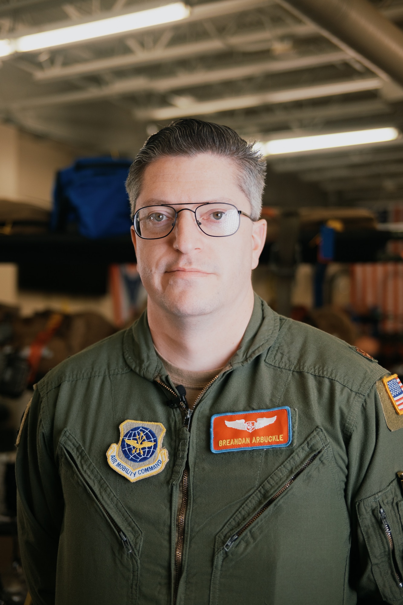 Maj. Brendan Arbuckle, 375th Aeromedical Evacuation Squadron chief of tactics, poses for a portrait, Jan. 24, 2025, at Scott Air Force Base, Ill.