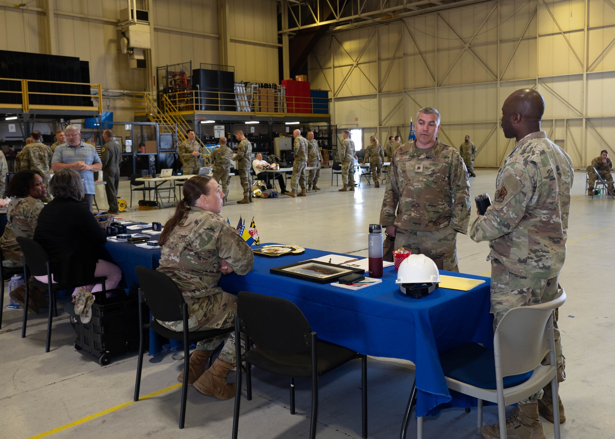 Members of the Maryland Air National Guard participate in the first day of the 175th Wing Resource Fair at Warfield Air National Guard Base at Martin State Airport, Maryland, May 1, 2025. In response to the planned divestment of the A-10C Thunderbolt II aircraft and mission, support squadrons of the 175th Wing held a resource fair in the A-10 Maintenance Hangar to empower Airmen with knowledge and the opportunity to continue a prolific career path in the Maryland Air National Guard. (U.S. Air National Guard Photo by Airman 1st Class Sarah Hoover)