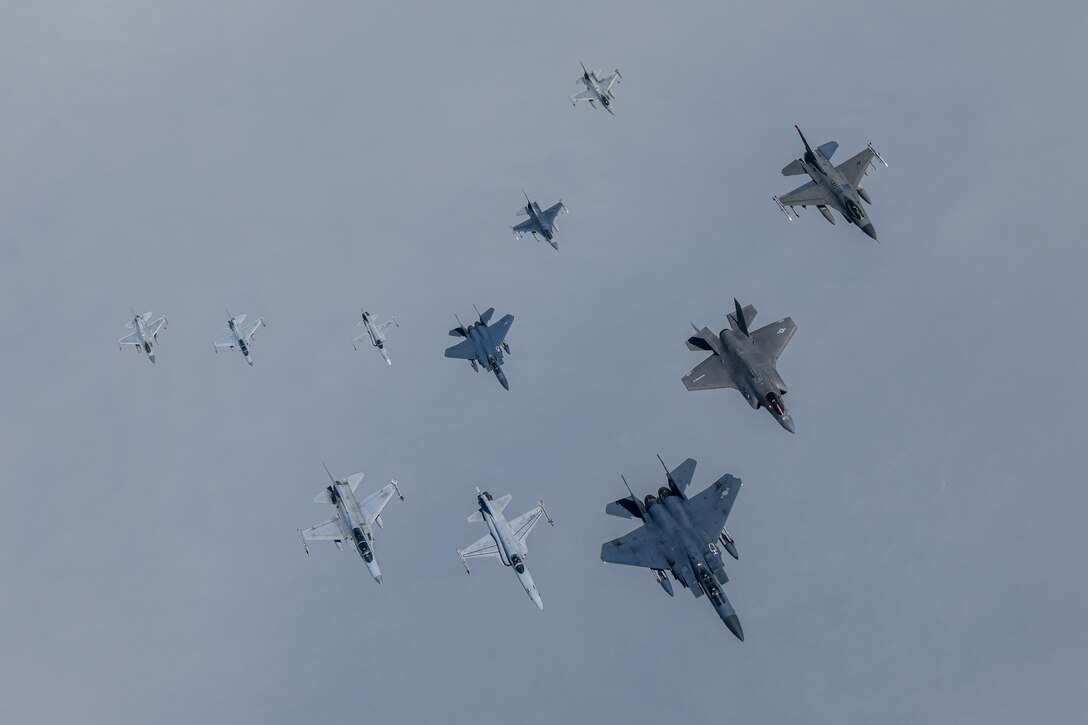 Republic of Korea and U.S. military aircraft fly in formation April 18, 2025. The aircraft will participate in Freedom Flag 25-1, a joint and bilateral military exercise between U.S. and Republic of Korea air forces that fosters trust, understanding and interoperability between Allied forces through challenging, realistic scenarios. From left in the front row: ROK FA-50, F-5, KF-15 Slam Eagle, U.S. F-35B Lightning II and F-16 Fighting Falcon. From left in the back row: ROK KF-16, FA-50, F-5, F-15K, U.S. F-16 and ROK F-16. (Courtesy photo)