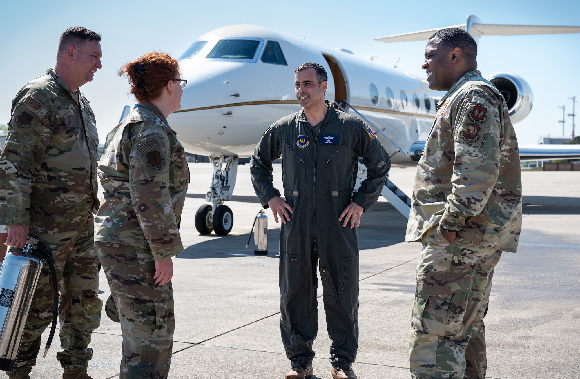 U.S. Air Force Col. Jamil I. Musa, 86th Airlift Wing deputy commander, center, speaks with Kaiserslautern Military Community leadership after his “fini flight” at Ramstein Air Base, Germany, April 29, 2025. As the deputy commander, he is second-in-command of a wing comprising seven groups and 30 squadrons across four installations in Germany, Spain, Belgium, and Portugal. Musa will take command of the 436th Airlift Wing at Dover Air Base, Delaware. (U.S. Air Force photo by Senior Airman Jared Lovett)
