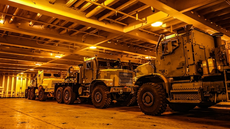 U.S. Marine Corps Maritime Prepositioning Force assets from the United States Naval Ship Seay (T-AKR 302) await offload in preparation for the Maritime Prepositioning Force Maintenance Cycle (MMC) 14 at Marine Corps Support Facility Blount Island.