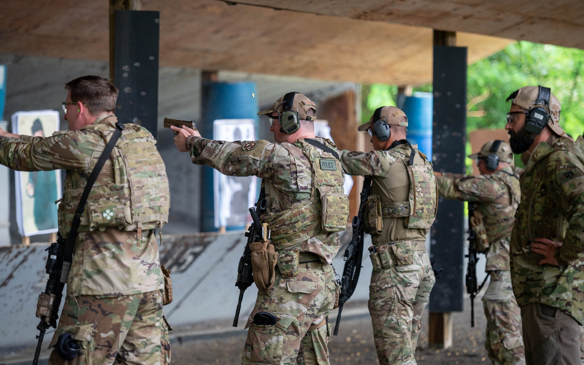 A Blount County Special Weapons and Tactics team member supervises 134th Security Forces members as they focus on the fundamentals of shooting, working on sight alignment, trigger control, and breathing during a tactical shooting training on May 3,2025. Joint training opportunities like this strengthen community partnerships while reinforcing the 134th’s commitment to both local and national security objectives.