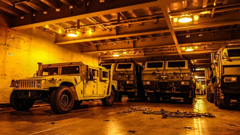 U.S. Marine Corps Maritime Prepositioning Force assets from the United States Naval Ship Seay (T-AKR 302) await offload in preparation for the Maritime Prepositioning Force Maintenance Cycle (MMC) 14 at Marine Corps Support Facility Blount Island.