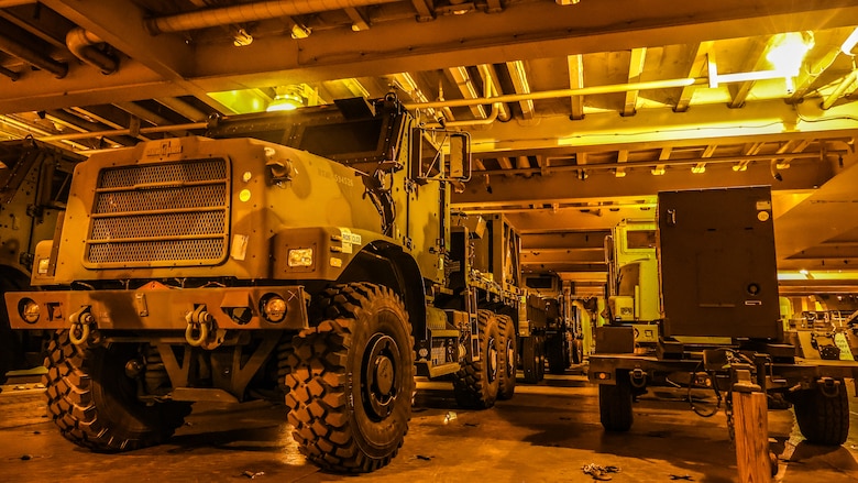 U.S. Marine Corps Maritime Prepositioning Force assets from the United States Naval Ship Seay (T-AKR 302) await offload in preparation for the Maritime Prepositioning Force Maintenance Cycle (MMC) 14 at Marine Corps Support Facility Blount Island.