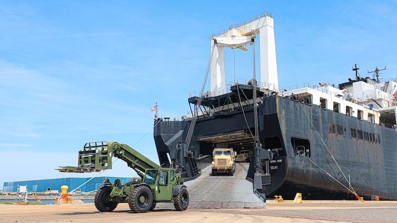 U.S. Marine Corps Maritime Prepositioning Force assets from the United States Naval Ship Seay (T-AKR 302) Roll off from the stern ramp in preparation for the Maritime Prepositioning Force Maintenance Cycle (MMC) 14 at Marine Corps Support Facility Blount Island.