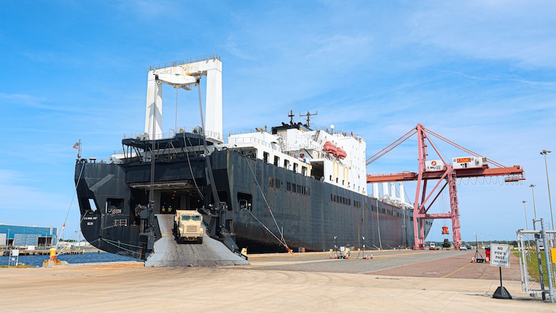 U.S. Marine Corps Maritime Prepositioning Force assets from the United States Naval Ship Seay (T-AKR 302) Roll off from the stern ramp in preparation for the Maritime Prepositioning Force Maintenance Cycle (MMC) 14 at Marine Corps Support Facility Blount Island.