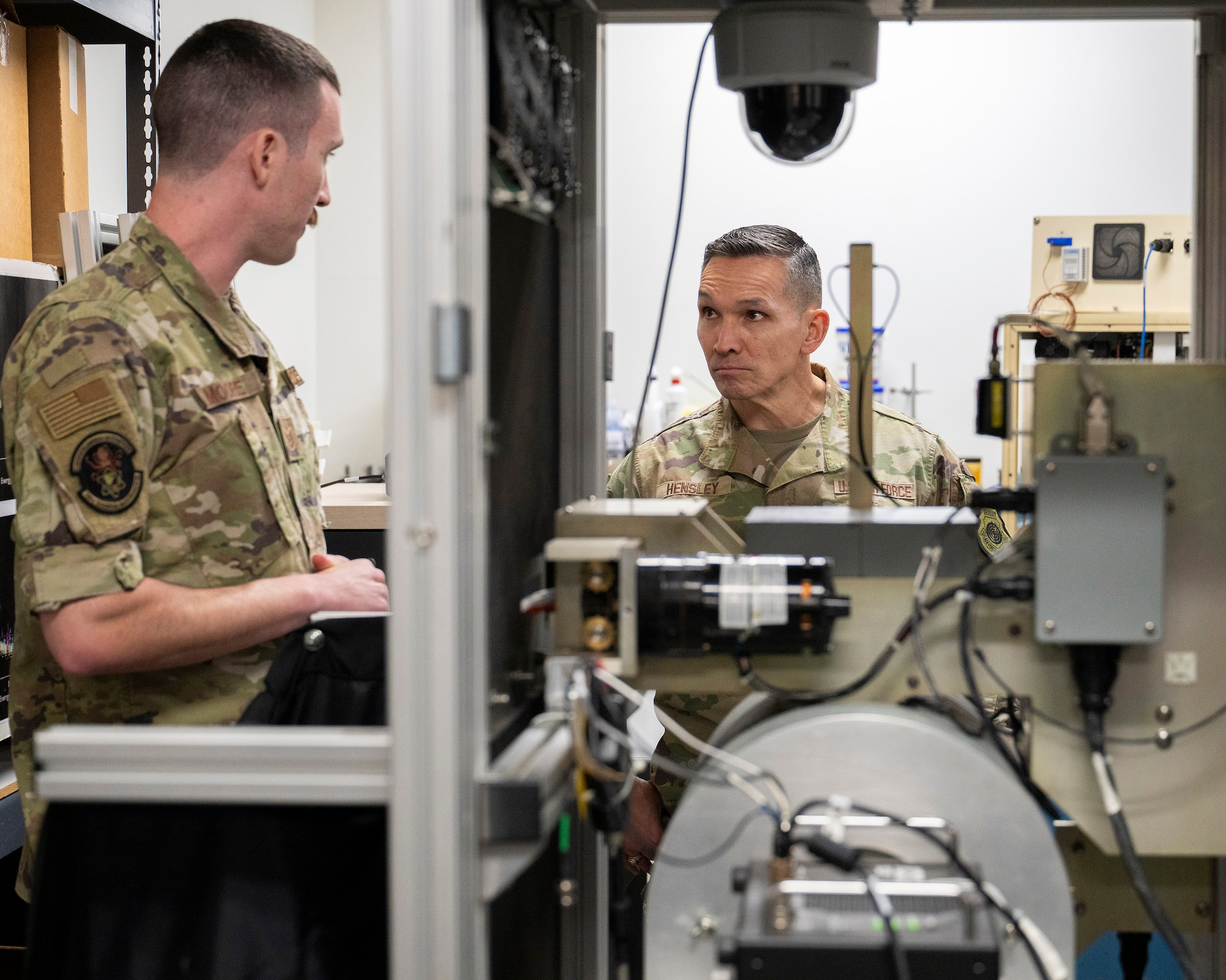 Tech. Sgt. Jacob Moore, a field maintenance engineer at the Air Force Technical Applications Center, explains to Lt. Gen. Thomas K. Hensley, commander of 16th Air Force (Air Forces Cyber), how the maintenance and sustainment of AFTAC’s global network of material samplers is achieved.  Hensley visited the Department of Defense’s sole nuclear surveillance center to learn more about the organization’s dynamic and evolving role in detecting, verifying, and analyzing global nuclear activity in real time. (U.S. Air Force photo by Matthew S. Jurgens)