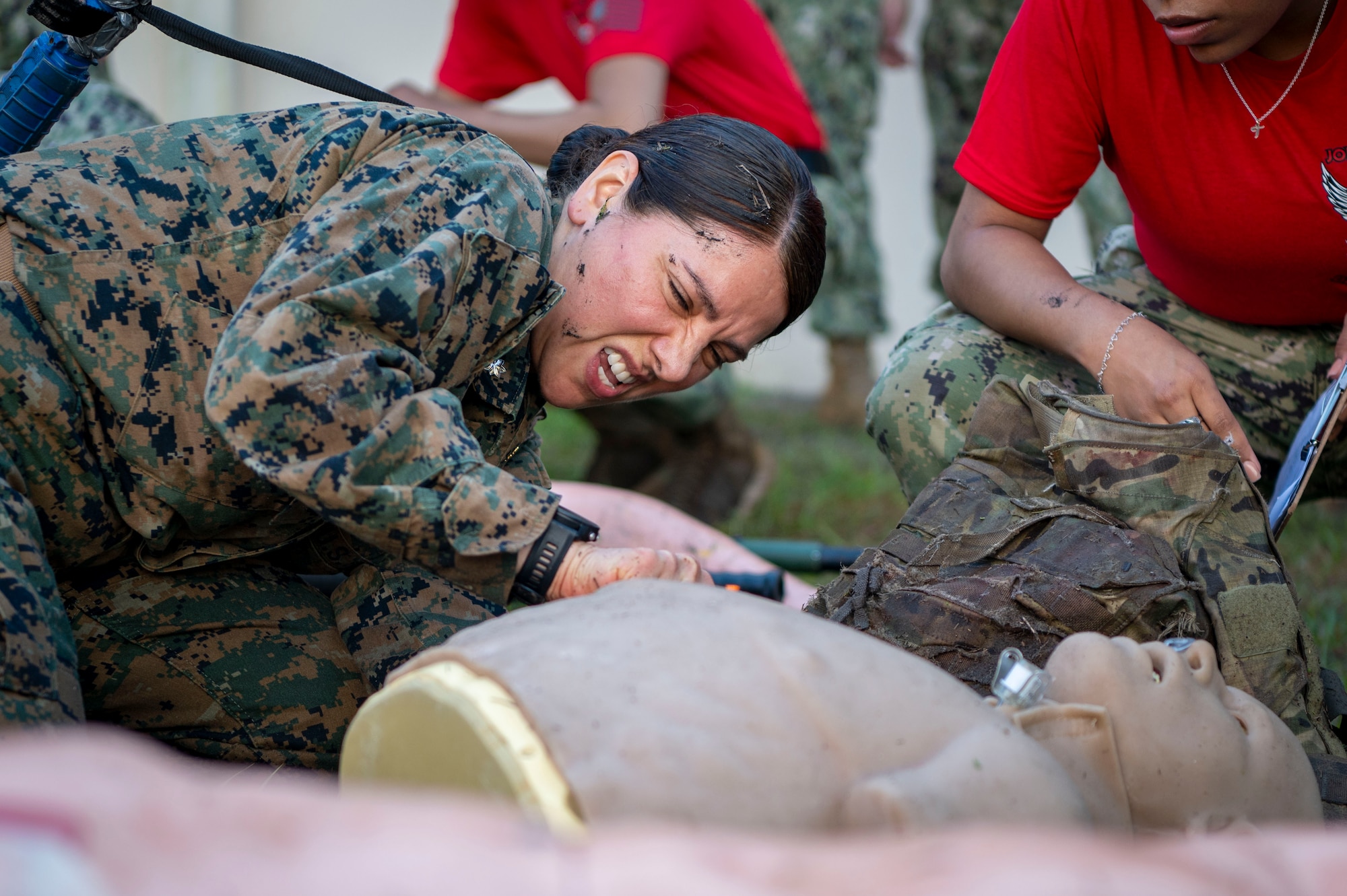 U.S. Navy Commander Flavia Soto performs Tactical Combat Care on a manikin at MacDill Air Force Base, Florida, during Operation Blue Horizon2025. OBH is a joint force exercise that reinforces core competencies and fundamental practices for military medical professionals. (Airman 1st Class Alicia Campbell)