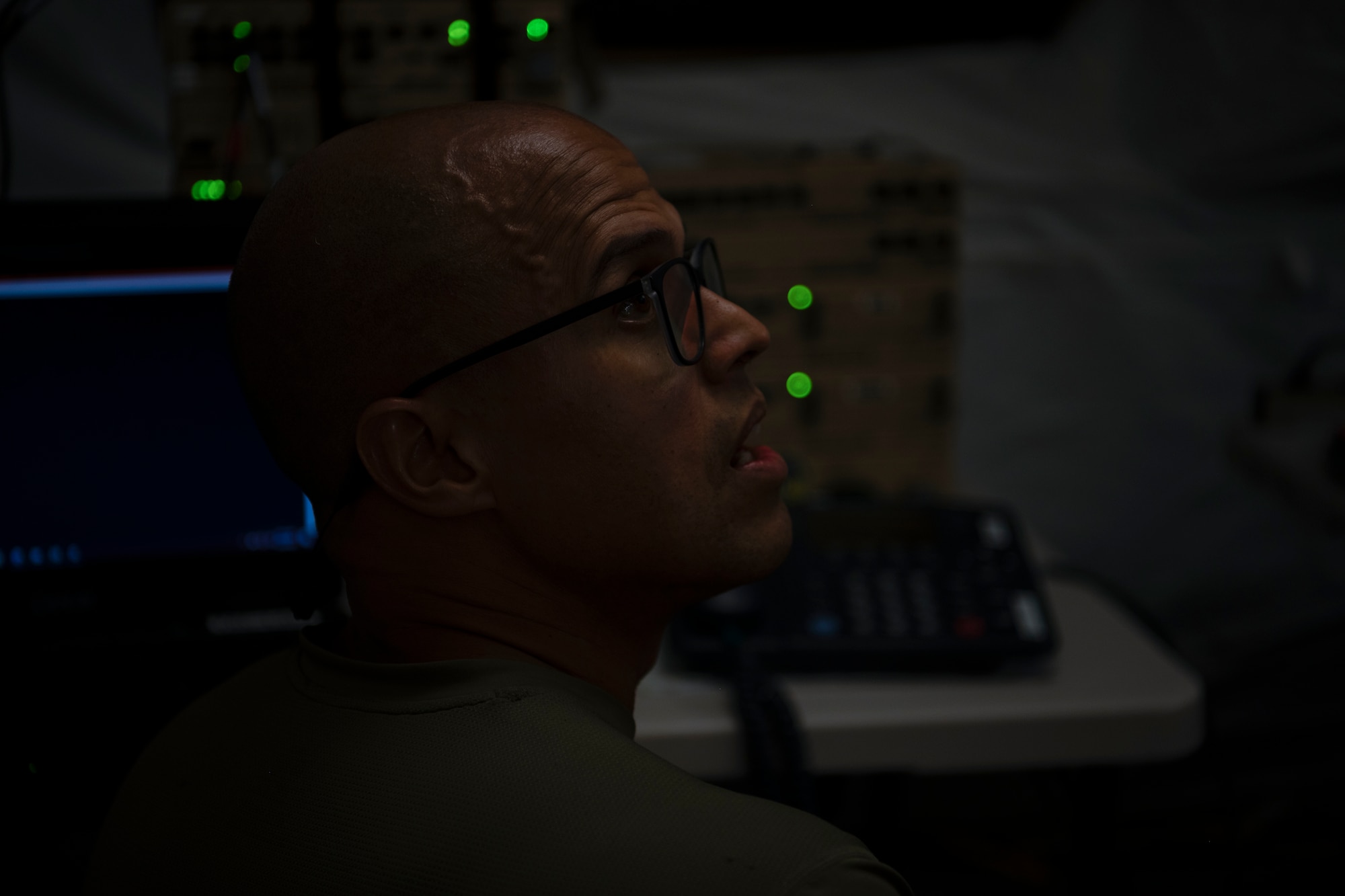 U.S. Air Force Staff Sgt. Luis Villalobos, a network operations specialist with the 156th Combat Communications Squadron, Puerto Rico Air National Guard, sets-up an expeditionary communications package during a Full Operating Capability (FOC) evaluation at Punta Salinas Air National Guard Station, Toa Baja, Puerto Rico, April 24, 2025. A team of approximately 25 Airmen assigned to the 156th CBCS were evaluated on their level of proficiency in providing NIPR, SIPR, and VOIP services in an expeditionary setting as part of the FOC certification process. (U.S. Air National Guard photo by Senior Airman Victoria Jewett)