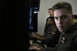 U.S. Air Force 1st Lt. Grant Geschwentner, 17th Attack Squadron from Creech Air Force Base, Nev., participates in Reaper Smoke, an MQ-9 Reaper enterprise-wide competition that highlights the skills and advancements within the community, March Air Reserve Base, Calif., April 23, 2025. Each team is judged on crew utilization, time on target, tactics and key target identification during a 30-minute tactical scenario to mimic maritime surface warfare.