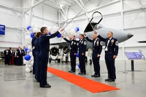 Chief master sergeants form a saber cordon for inductees to walk through during a Chief Master Sergeant Recognition Ceremony at Hill Air Force Base, Utah, May 2, 2025. Reaching the rank of chief master sergeant is a significant milestone, achieved by only 1% of the total enlisted force in the U.S. Air Force. The event celebrated the hard work and dedication of the new chiefs while reinforcing the standards expected of those who wear the rank of chief master sergeant. (U.S. Air Force photo by R. Nial Bradshaw)
