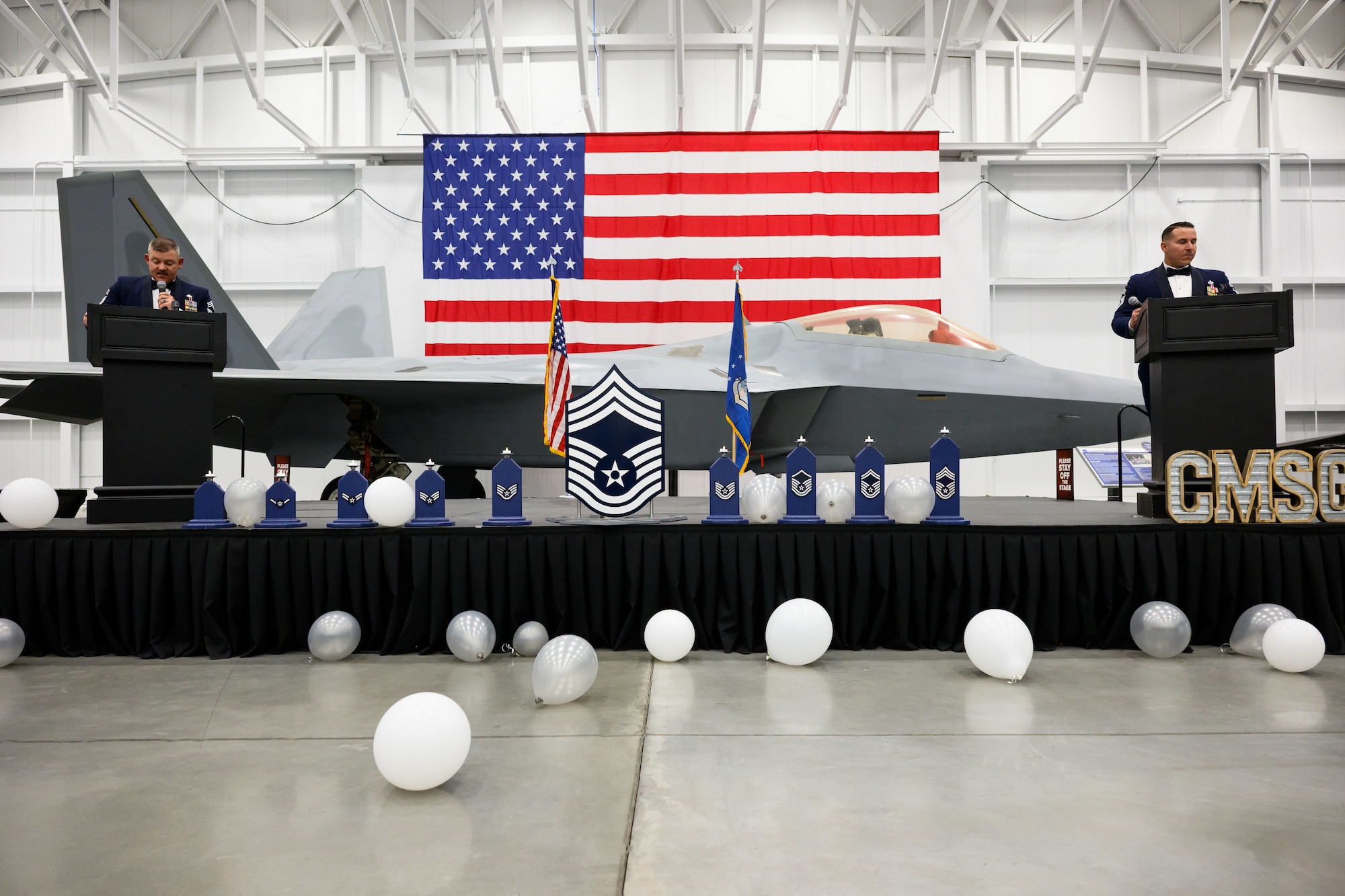 Left, Chief Master Sgt. R.W. Ehart, 419th Maintenance Squadron, and Chief Master Sgt. Christian Suarez, 421st Fighter Generation Squadron, serve as masters of ceremony during a Chief Master Sergeant Recognition Ceremony at Hill Air Force Base, Utah, May 2, 2025. Reaching the rank of chief master sergeant is a significant milestone, achieved by only 1% of the total enlisted force in the U.S. Air Force. The event celebrated the hard work and dedication of the new chiefs while reinforcing the standards expected of those who wear the rank of chief master sergeant. (U.S. Air Force photo by R. Nial Bradshaw)