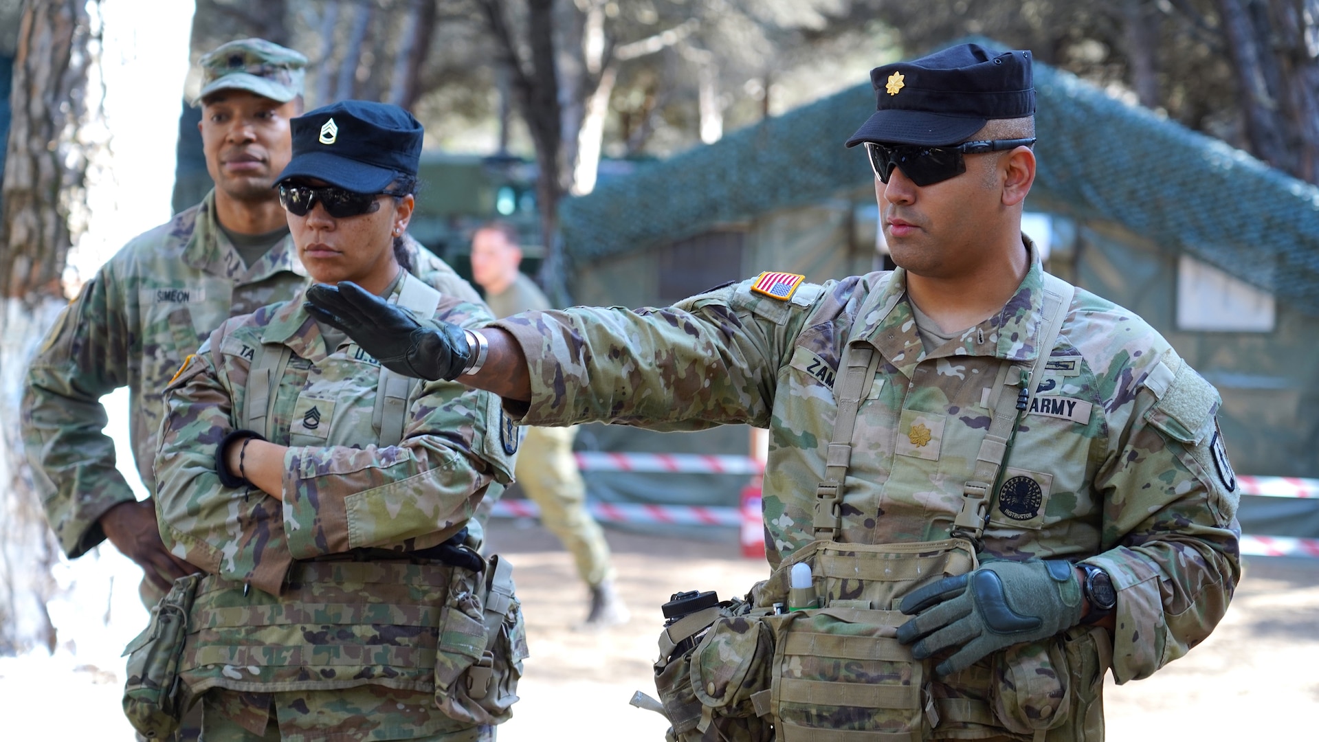 U.S. Army Maj. Pedro Zamora, commander of Echo Company, 2nd Battalion, Echo Company, 254th Regiment, briefs an operation order to New Jersey and New York Officer Candidates and Cadets from the Albanian Armed Forces Military Academy during a field training exercise in Rreth-Greth, Albania on April 21st, 2025.