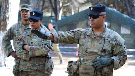 U.S. Army Maj. Pedro Zamora, commander of Echo Company, 2nd Battalion, Echo Company, 254th Regiment, briefs an operation order to New Jersey and New York Officer Candidates and Cadets from the Albanian Armed Forces Military Academy during a field training exercise in Rreth-Greth, Albania on April 21st, 2025.