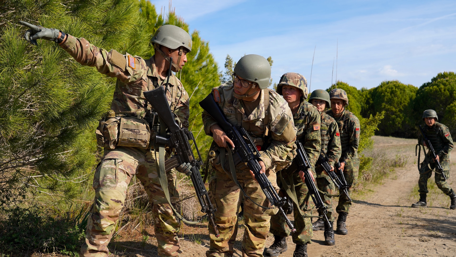 New Jersey and New York Officer Candidates conduct Situational Tactical Exercise lanes with cadets from Albania and Kosovo.
