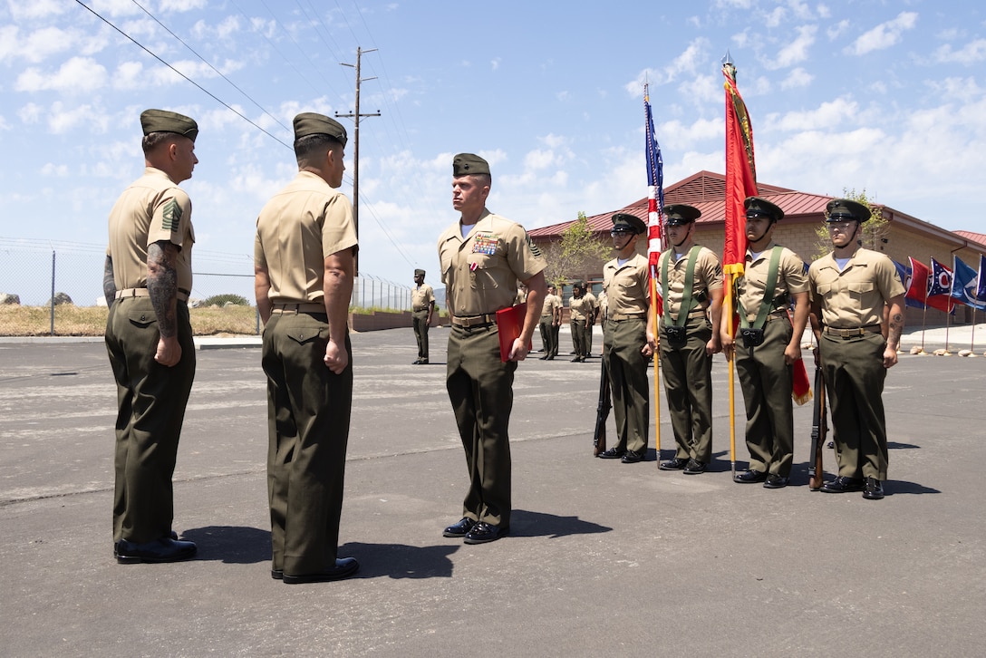 U.S. Marine Corps Sgt. Maj. Gregory Reyst Jr., the outgoing sergeant major of 1st Air Naval Gunfire Liaison Company, I Marine Expeditionary Force Information Group, receives a meritorious service medal during a relief and appointment ceremony at Marine Corps Base Camp Pendleton, California, May 1, 2025. The ceremony represents passing of authority from the outgoing sergeant major to the incoming sergeant major (U.S. Marine Corps photo by Lance Cpl. Caleb Goodwin)