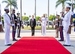 Colombian Minister of Defense Pedro Sánchez and U.S. Navy Adm. Alvin Holsey, commander of U.S. Southern Command (SOUTHCOM), prepare to walk to the entrance of the SOUTHCOM headquarters as honors are rendered, May 5, 2025, in Doral, Florida. Sánchez visited SOUTHCOM to meet with command leaders to discuss the U.S.-Colombian bilateral defense partnership and regional security. (Photo by Mass Communication Specialist 1st Class Samantha Oblander, SOUTHCOM Public Affairs)