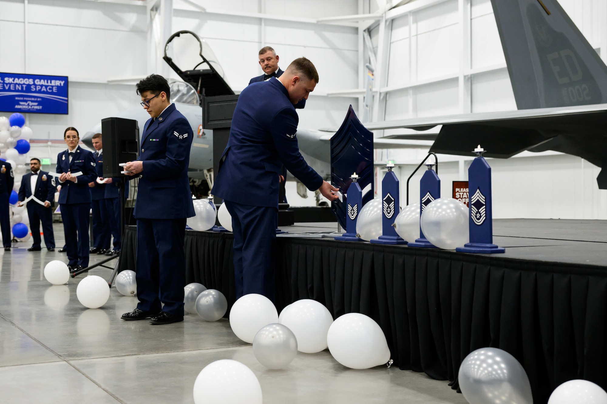 Airmen build the chief master sergeant rank during the enlisted heritage portion of a Chief Master Sergeant Recognition Ceremony at Hill Air Force Base, Utah, May 2, 2025. Reaching the rank of chief master sergeant is a significant milestone, achieved by only 1% of the total enlisted force in the U.S. Air Force. The event celebrated the hard work and dedication of the new chiefs while reinforcing the standards expected of those who wear the rank of chief master sergeant. (U.S. Air Force photo by R. Nial Bradshaw)