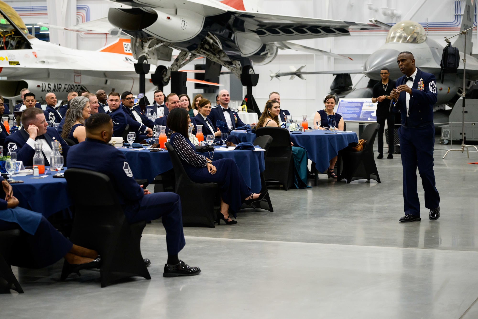 Retired Chief Master Sgt. Juan Lewis speaks during a Chief Master Sergeant Recognition Ceremony at Hill Air Force Base, Utah, May 2, 2025. Reaching the rank of Chief Master Sergeant is a significant milestone, achieved by only 1% of the total enlisted force in the U.S. Air Force. The event celebrated the hard work and dedication of the new chiefs while reinforcing the standards expected of those who wear the rank of chief master sergeant. (U.S. Air Force photo by R. Nial Bradshaw)