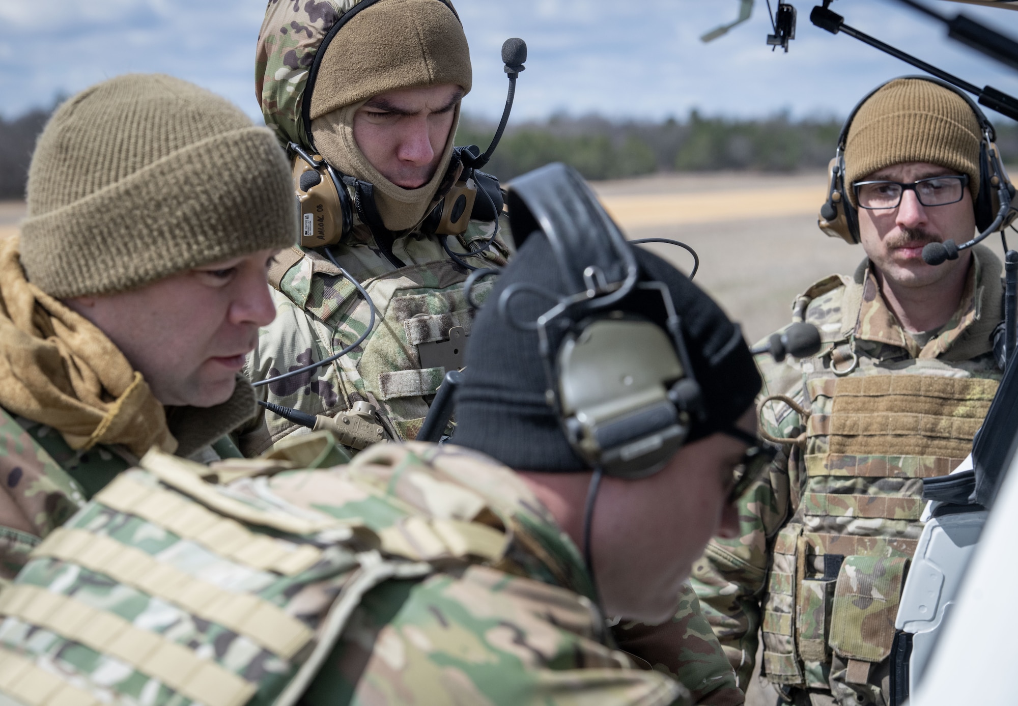 Students and staff with the Air Force’s Air Mobility Liaison Officer (AMLO) Qualification Course complete training April 15, 2025 at Young Air Assault Strip on South Post at Fort McCoy, Wis. Lt. Col. Andrew Baker, course director with the 435th Training Squadron at Scott Air Force Base, Ill., said the class previously conducted this training in Colorado, but for the first time brought the AMLO students to Fort McCoy because of the capabilities found on the post. During the week of their training, they focused on drop zone control and landing zone safety officer training. (U.S. Army Photo by Kevin Clark/Fort McCoy Multimedia-Visual Information Office)
