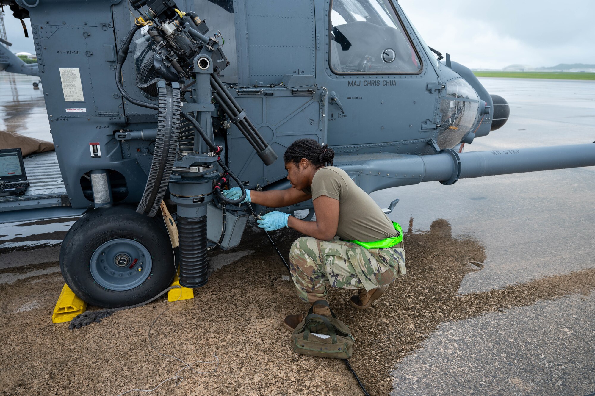A U.S. Air Force Airman maintains an HH-60W Jolly Green II.