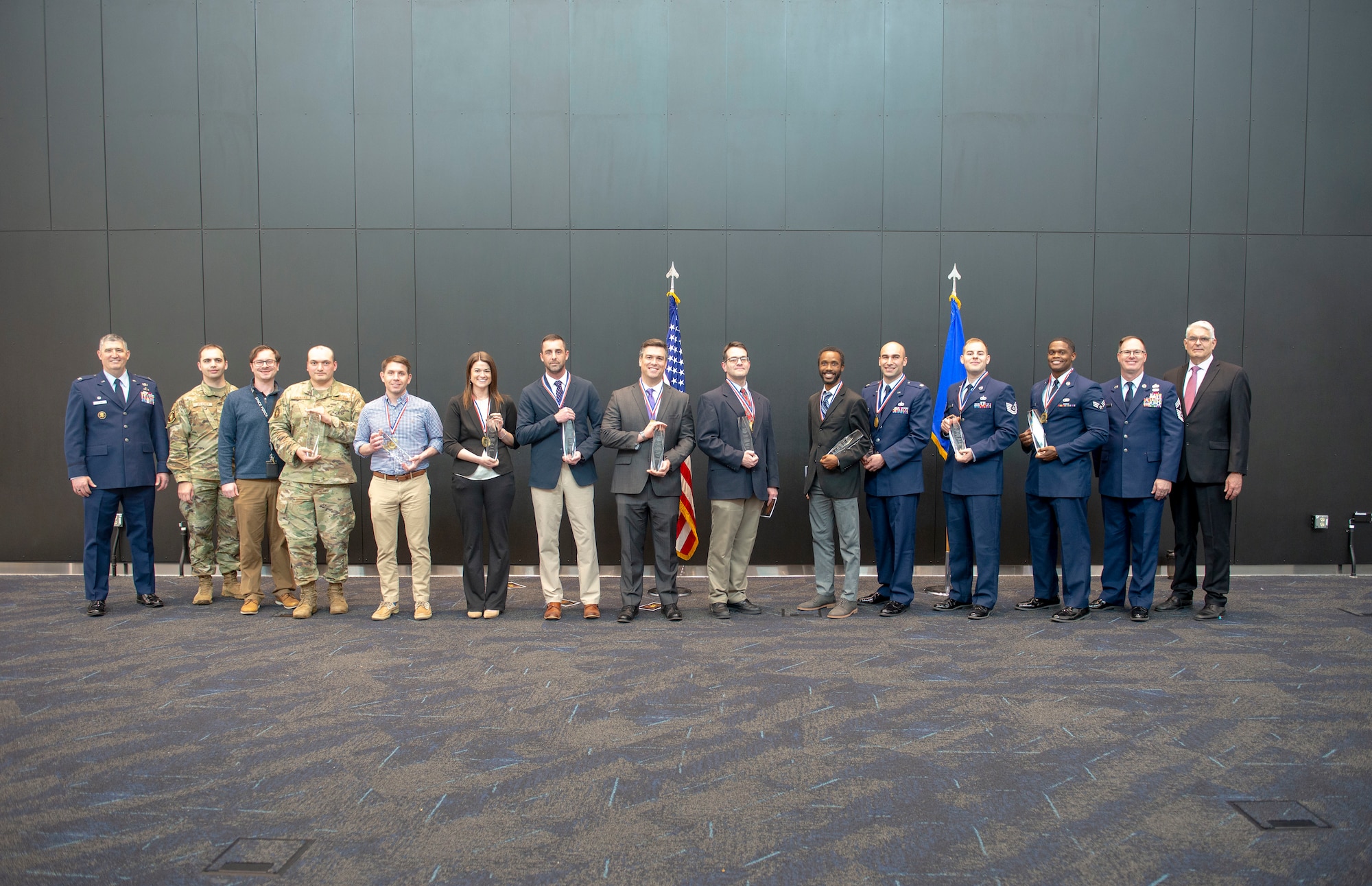 The winners of the 2024 NASIC Annual Awards gather to take a group photo.