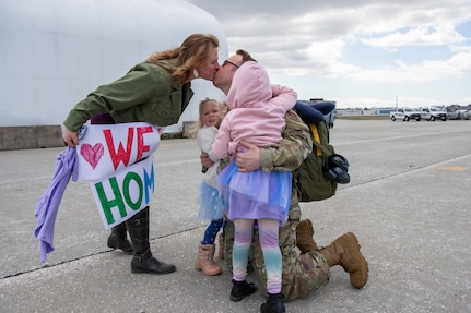 U.S. Air National Guard Airmen assigned to the 158th Fighter Wing return from deployment