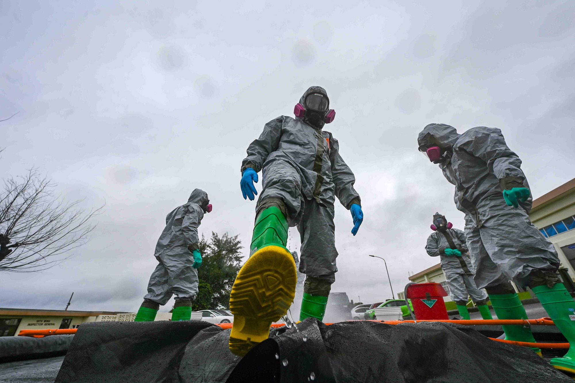 U.S. Air force Airmen perform decontamination procedures.