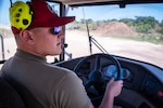 U.S. Air Force Airman First Class Braylon McCoy,  pavements and heavy equipment operator assigned to the 200th Rapid Engineer Deployable Heavy Operational Repair Squadron Engineer (RED HORSE) Squadron Detachment, Mansfield, Ohio, operates heavy equipment used in brush removal at Northwest Field, Andersen Air Force Base, Guam, April 4, 2025. The 200th RED HORSE Squadron is on a deployment for training working for the 513th Expeditionary RED HORSE Squadron as part of the 356 Expeditionary Civil Engineering Group in Pacific Air Force’s efforts to set the theaters.