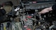 Airmen assigned to the 5th Logistics Readiness Squadron vehicle maintenance flight replace parts on a High Mobility Multipurpose Wheeled Vehicle (Humvee) alternator at Minot Air Force Base, North Dakota, April 30, 2025. The Humvee has a maximum speed of 70 mph depending on the configuration and has an effective range of 300 miles. (U.S. Air Force photo by Airman 1st Class Wesley Davies)
