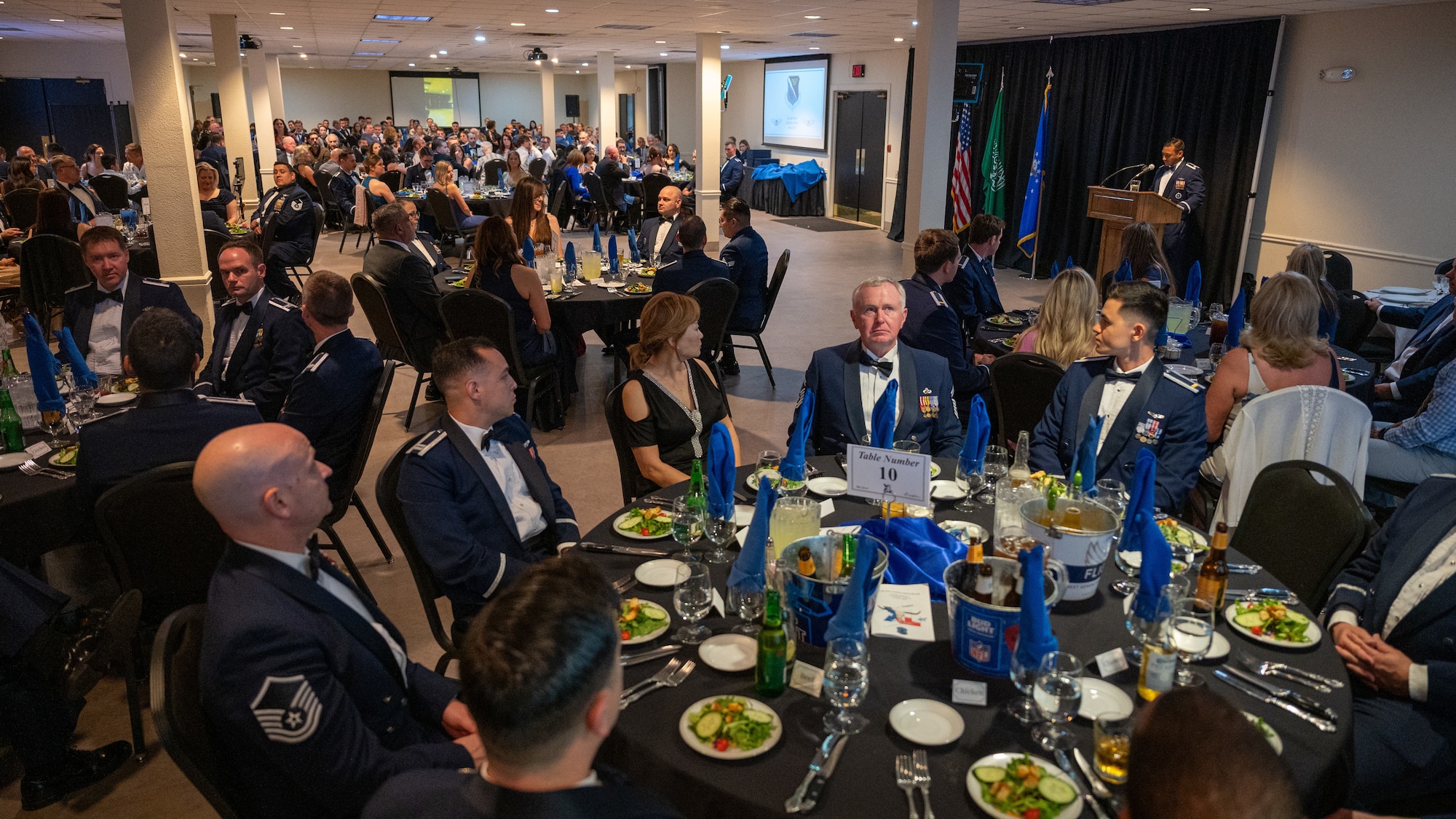 U.S. Air Force Lt. Col. Imran Khan, 85th Flying Training Squadron commander, speaks at the graduation of Class 25-09 at Laughlin Air Force Base, Texas, May 1, 2025. The 25-09 graduating class consisted of 31 students from the U.S. and Saudi Arabia. (U.S. Air Force photo by Staff Sgt. Nicholas Larsen)