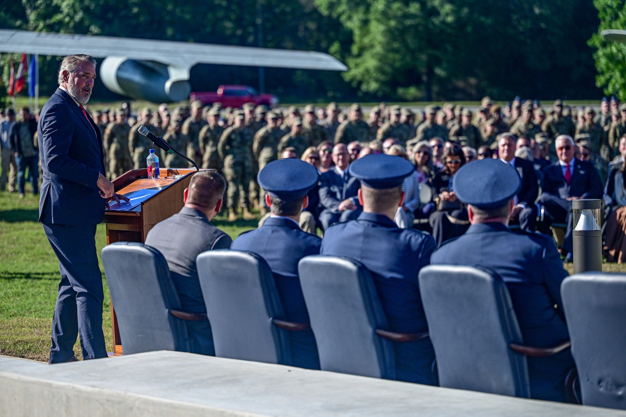 An Airman speaks during a ceremony.