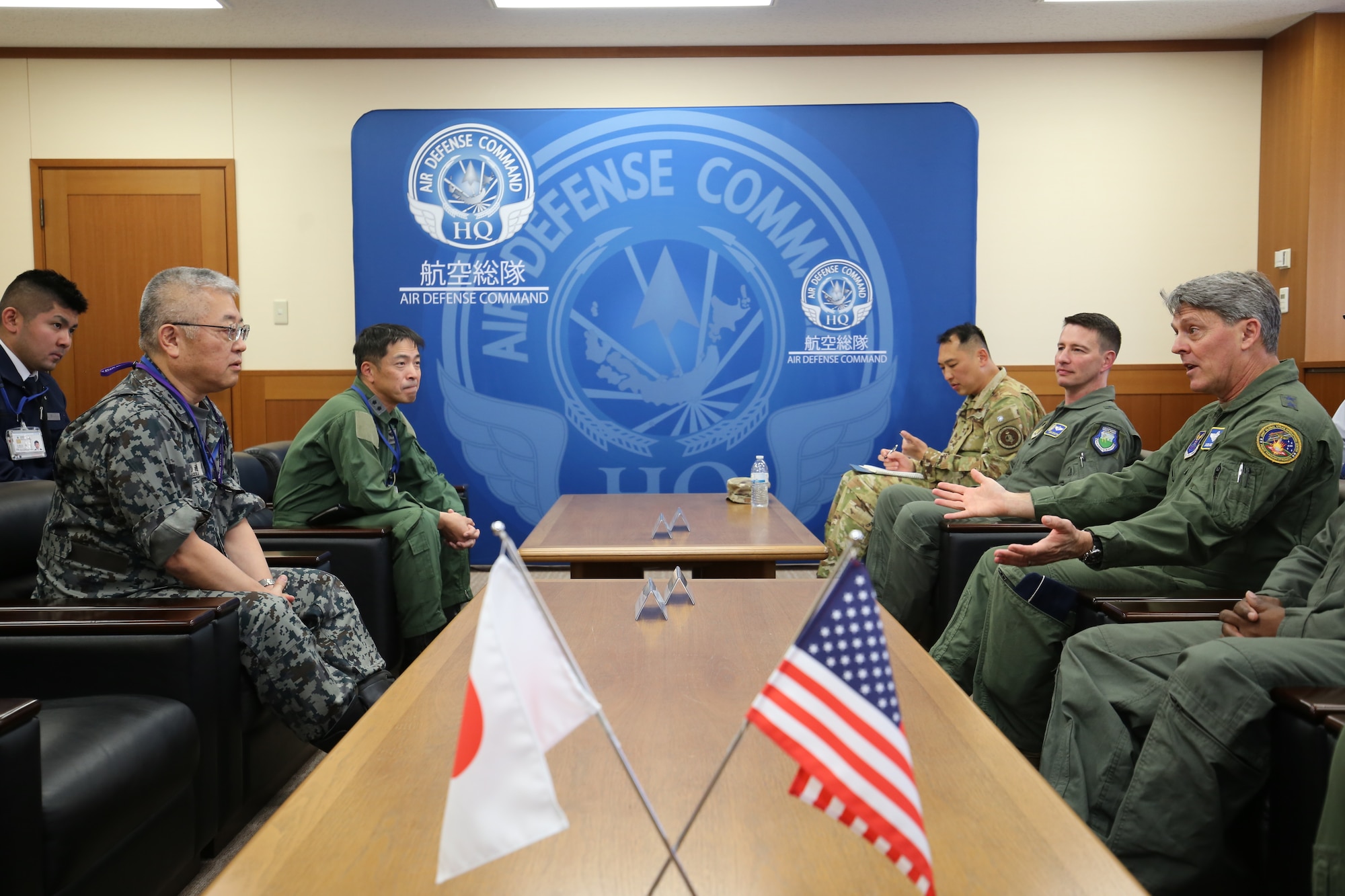 Japan Air Self-Defense Force Lt. Gen. Seiki Kageura, left, deputy commander of the Air Defense Command listens to U.S. Air Force Maj. Gen. Jason Armagost, commander Eighth Air Force and Joint-Global Strike Operations Center