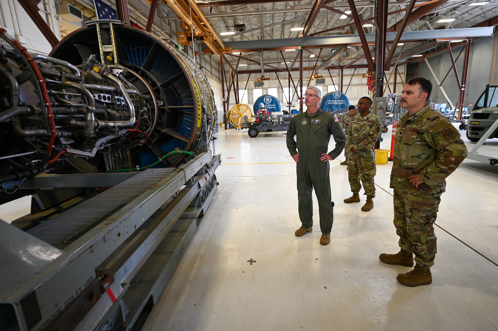 Lt. Col. Brandon Rodts, 433rd Maintenance Group deputy commander, shows Col. Rick Kuehn, 512th Airlift Wing deputy wing commander, a C-5M Super Galaxy engine being serviced during a tour of the maintenance facilities at the 433rd AW on Joint Base San Antonio-Lackland, Texas April 25, 2025.