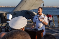 Vice Adm. George Wikoff, commander of U.S. Naval Central Forces Command and U.S. Fifth Fleet, speaks at a reception onboard the Arleigh Burke-class guided-missile destroyer USS Truxtun (DDG 103) in the U.S. Central Command area of responsibility.