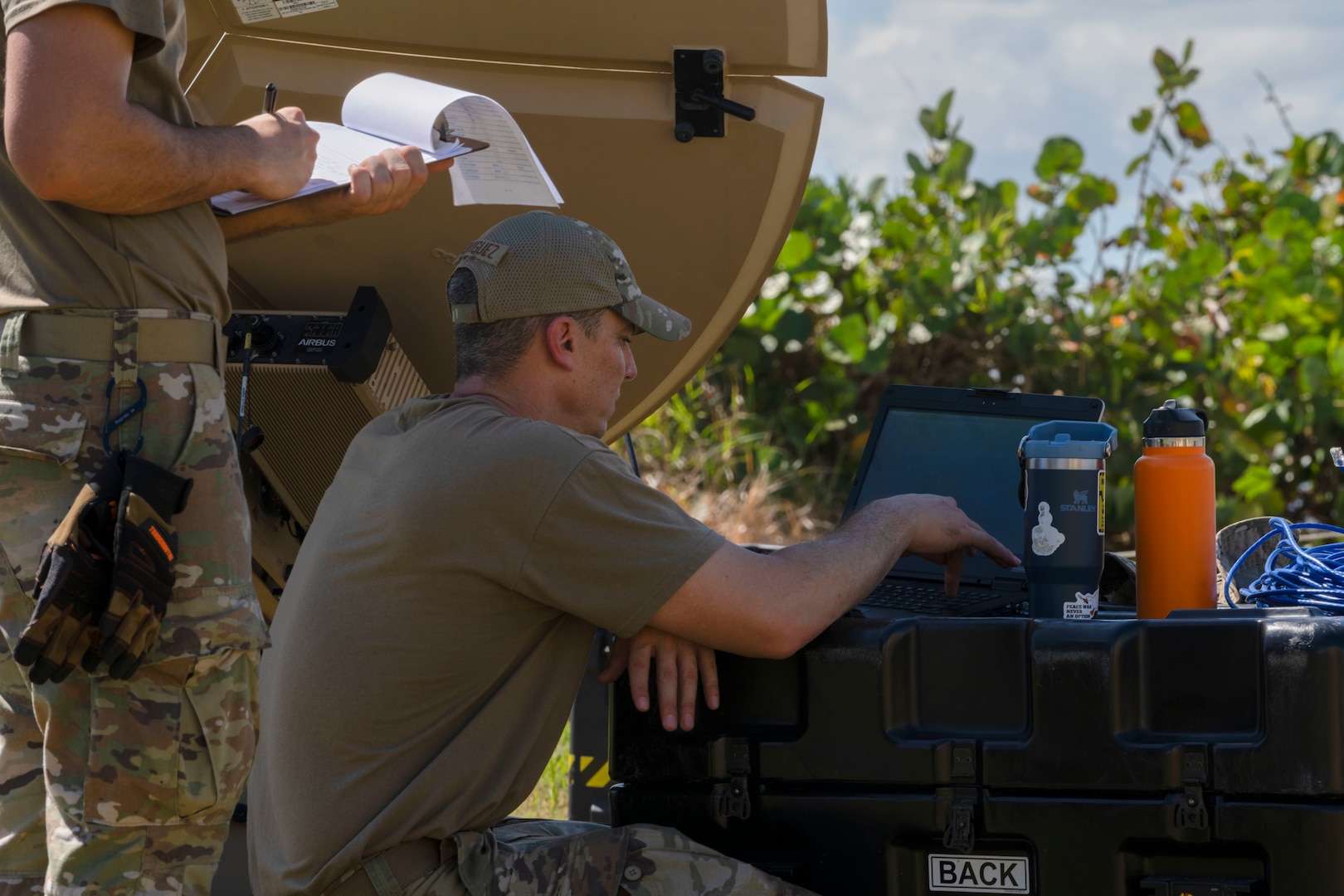 U.S. Air Force Master Sgt. Jose Rodriguez, the radio frequency non-commissioned officer in charge with the 156th Combat Communications Squadron, Puerto Rico Air National Guard, sets-up an Airbus 2.4 antenna, during a Full Operating Capability (FOC) evaluation at Punta Salinas Air National Guard Station, Toa Baja, Puerto Rico, April 24, 2025. A team of approximately 25 Airmen assigned to the 156th CBCS were evaluated on their level of proficiency in providing NIPR, SIPR, and VOIP services in an expeditionary setting as part of the FOC certification process. (U.S. Air National Guard photo by Senior Airman Victoria Jewett)