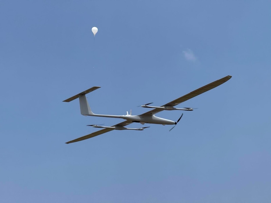 A U.S. Army modular K1000 ultra-long range endurance Unmanned Aircraft System and a High-Altitude Balloon assigned to Extended Range and Sensing Effects Company, 1st Multi-Effects Battalion, 1st Multi-Domain Task Force launch simultaneously to survey the area in support of Exercise Balikatan 25, in Naval Station Leovigildo Gantioqui, Philippines, April 28, 2025.