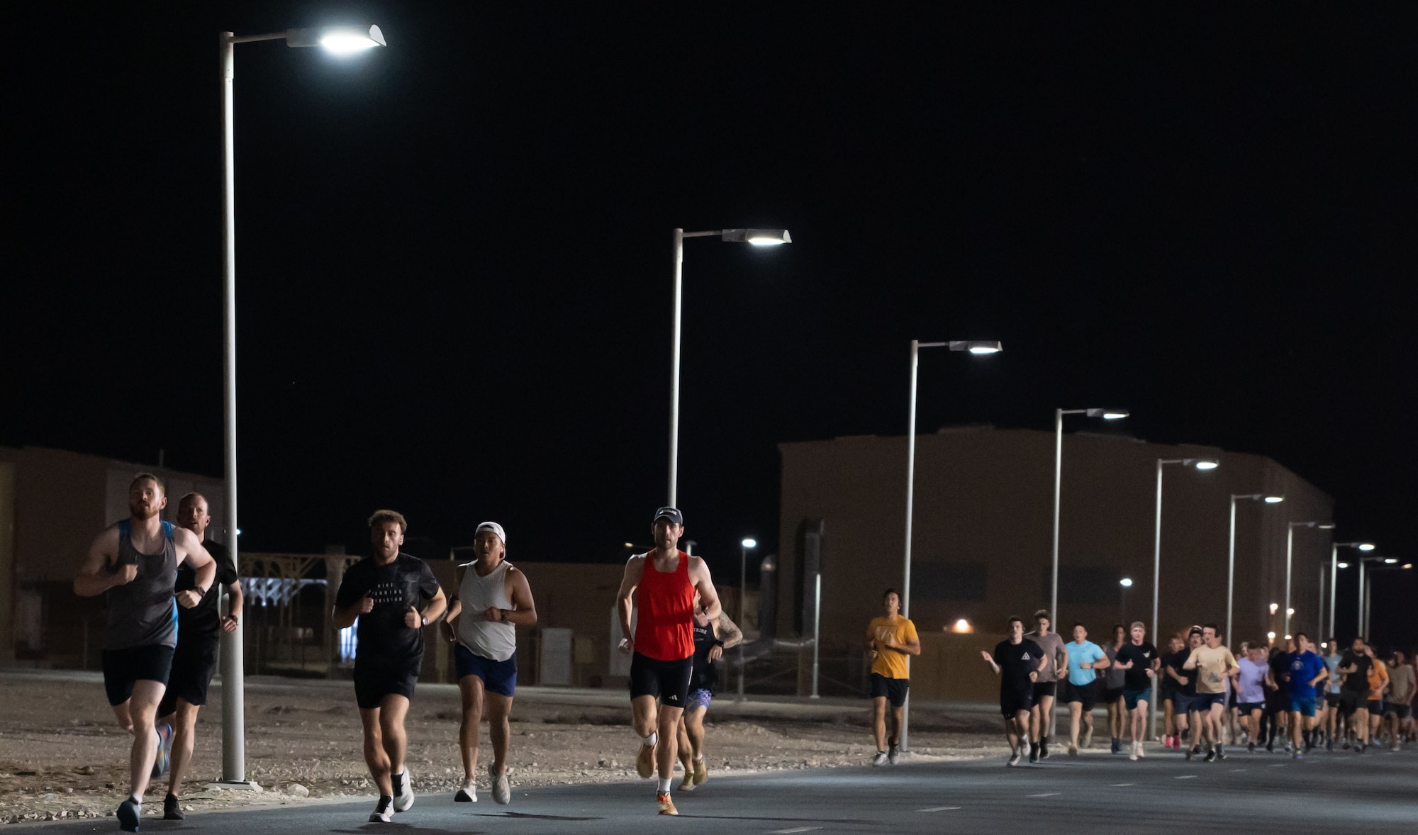 Participants run during the Royal Air Force Falcons Launch 5K Run within the U.S. Central Command area of responsibility, May 1, 2025. The event gave coalition forces an opportunity to engage in camaraderie and friendly competition.(U.S. Air Force photo by Senior Airman Dieondiere Jefferies)