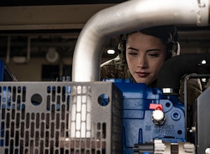 U.S. Air Force Airman 1st Class Gracie Gary, 100th Civil Engineer Squadron power production journeyman, inspects a generator as the ignition starts at RAF Mildenhall, England, May 2, 2025