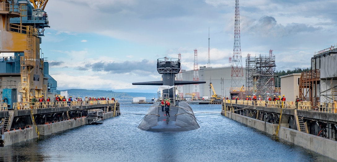 Trident Refit Facility, Bangor team members work together to undock USS Maine